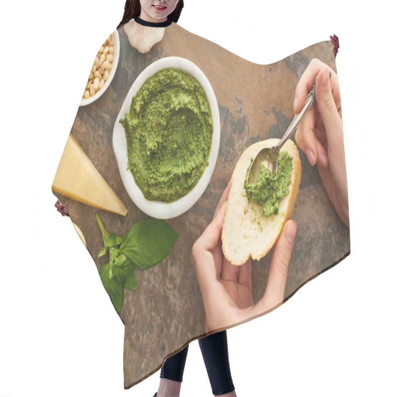 Personality  Cropped View Of Woman Adding Pesto Sauce On Baguette Slice Near Fresh Ingredients On Stone Surface Hair Cutting Cape