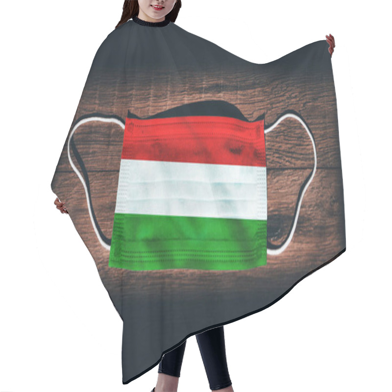 Personality  Hungary National Flag At Medical, Surgical, Protection Mask On Black Wooden Background. Coronavirus Covid19, Prevent Infection, Illness Or Flu. State Of Emergency, Lockdown. Hair Cutting Cape