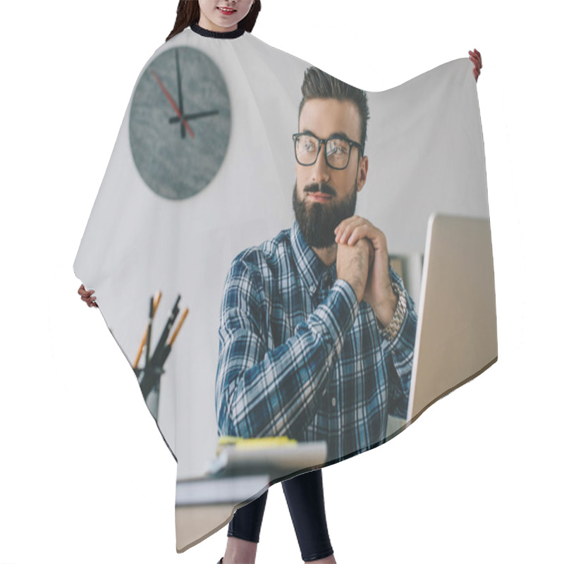 Personality  Thoughtful Young Seo Looking Away While Sitting At Workplace With Laptop Hair Cutting Cape