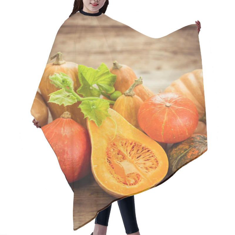 Personality  Close Up View Of Fresh Raw Pumpkins On Wooden Backdrop Hair Cutting Cape