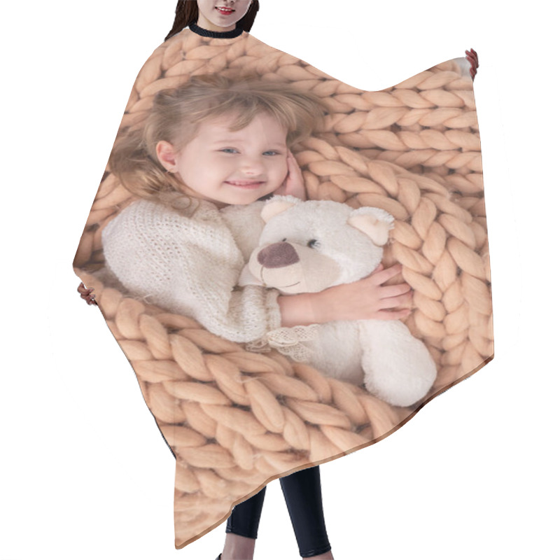 Personality  Baby Girl Under A Blanket Made Of Natural Sheep Wool. Merino Plain Knit Covers A Little Girl. The Baby Is Holding A Teddy Bear. The Sleeping Baby Folded His Arms Under His Head Hair Cutting Cape