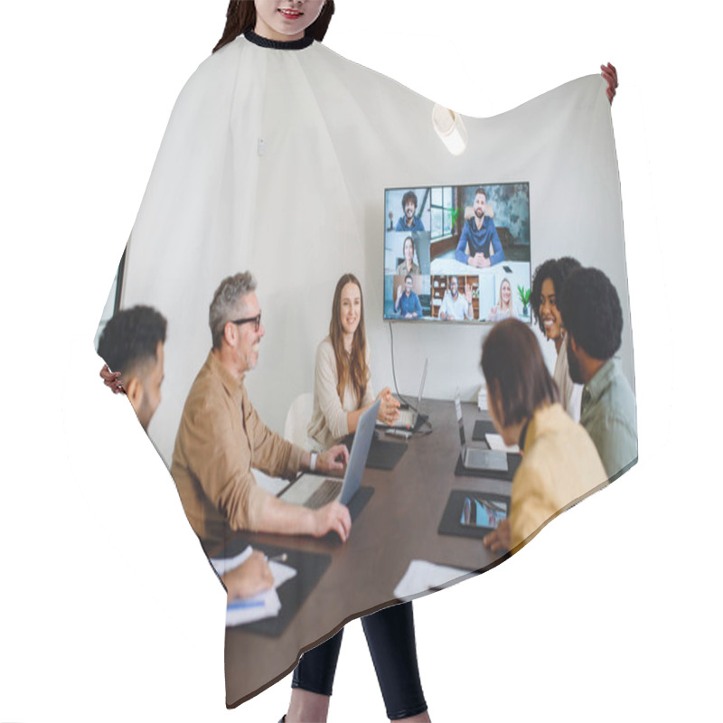 Personality  A Lively And Productive Team Meeting Is Captured Where Colleagues Are Connected Via A Large Screen, Showcasing A Blend Of In-person And Remote Collaboration. Virtual Meeting Concept Hair Cutting Cape