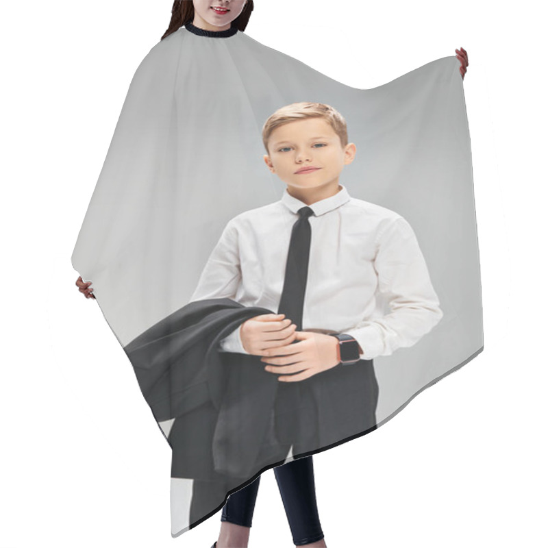 Personality  A Handsome Young Boy Is Dressed In A White Shirt And Black Tie, Exuding Elegance Against A Gray Backdrop. Hair Cutting Cape