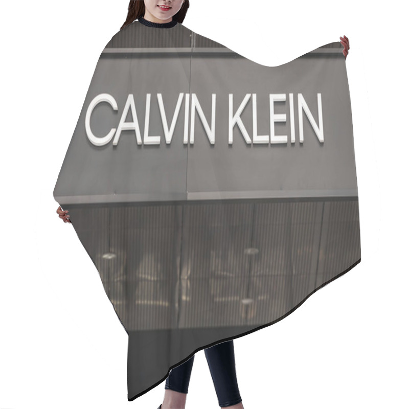 Personality  BELGRADE, SERBIA - AUGUST 19, 2018: Calvin Klein Logo On Their Main Store In Belgrade Serbia. Calvin Klein Is An American Fashion House And Luxury Goods Manufacturer Hair Cutting Cape