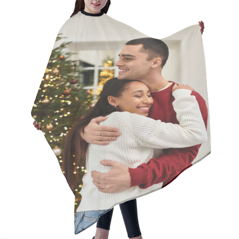 Personality  A Beautiful Couple Embraces Joyfully In Their Stylish, Festive Living Room During The Holidays. Hair Cutting Cape