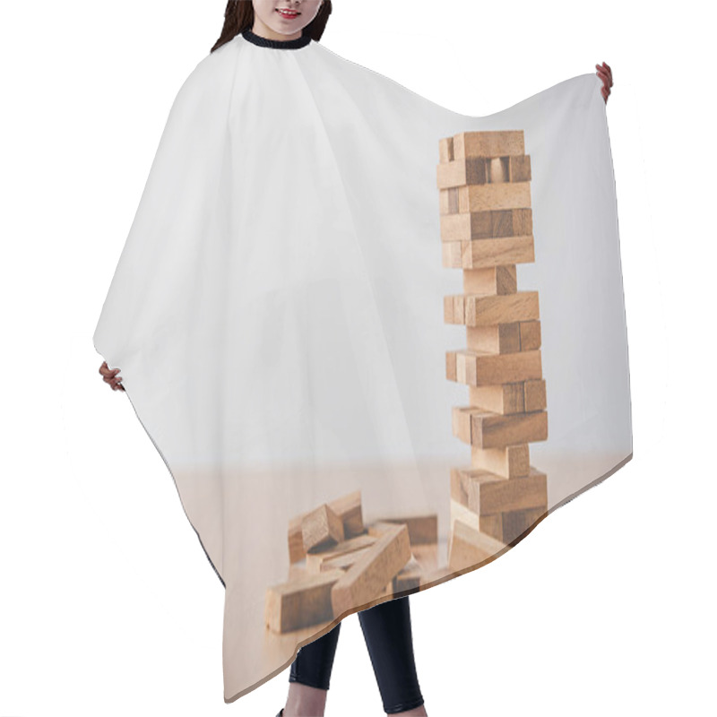 Personality  Game Drew To A Wooden Block From The Tower.concept  Business Risks In The Business. Requires Planning Meditation Must Be Careful In Deciding To Reduce The Risk In The Business.  Hair Cutting Cape