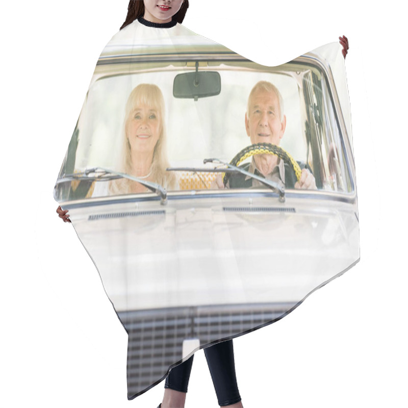 Personality  Front View Of Senior Man And Woman In Beige Car Hair Cutting Cape