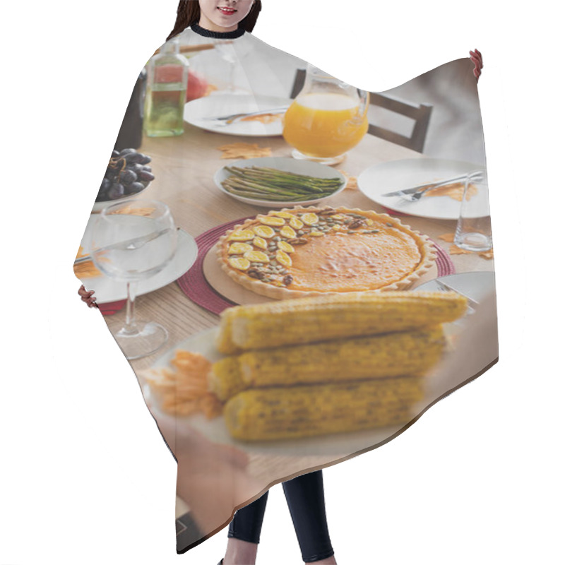 Personality  Cropped View Of Tasty Thanksgiving Dinner Near Blurred African American Woman With Corn  Hair Cutting Cape