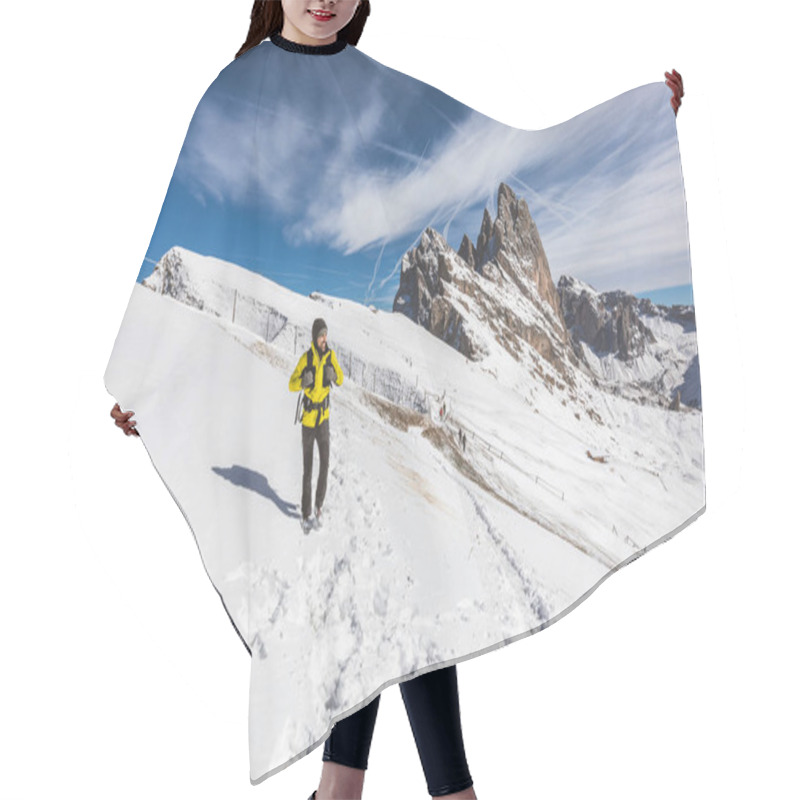 Personality  Man Hiking On Top Of Snowy Mountain. Happy Hiker Wearing A Yellow Jacket Walking On The Snow At Altitude With Beautiful View On Background. Adventure And Travel Concepts Hair Cutting Cape