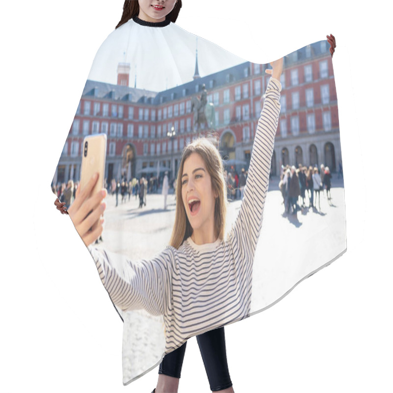 Personality  Beautiful Young Caucasian Student Tourist Woman Taking A Selfie Or Video For Her Tourism And Travel Around The World Blog Web In Plaza Mayor Madrid Spain. In Social Media And Vacations In Europe. Hair Cutting Cape