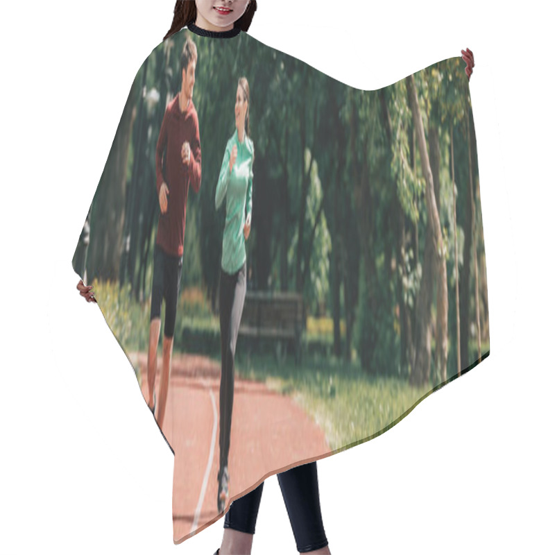 Personality  Panoramic Crop Of Couple Smiling At Each Other While Jogging In Park  Hair Cutting Cape