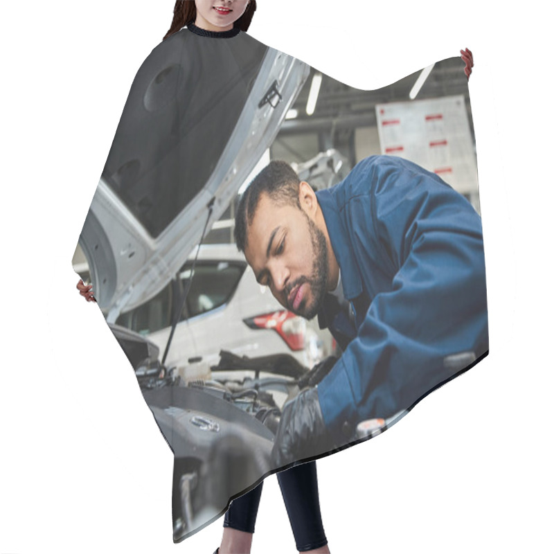 Personality  Handsome Mechanic Repairs A Car Engine While Focusing Intently In A Busy Workshop Space. Hair Cutting Cape