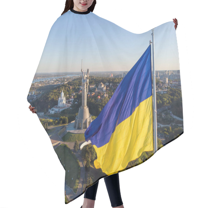 Personality  Aerial Drone Flyby Shot In Kyiv - Biggest National Flag Of Ukraine. Aerial View. Spivoche Pole, Kiev Hair Cutting Cape