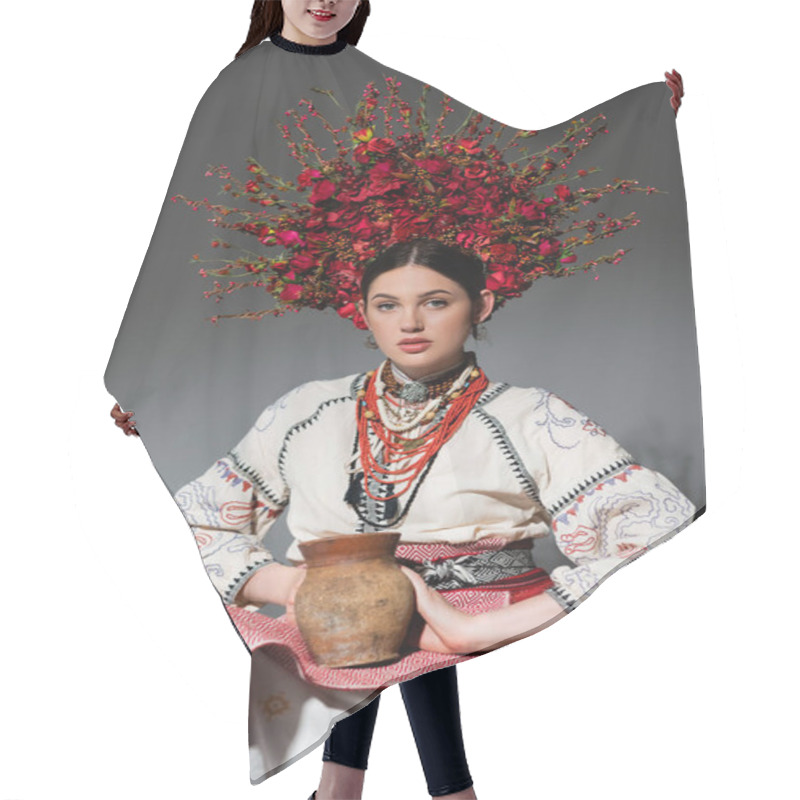 Personality  Young Ukrainian Woman In Traditional Clothes And Red Wreath With Flowers Holding Clay Pot On Grey Hair Cutting Cape