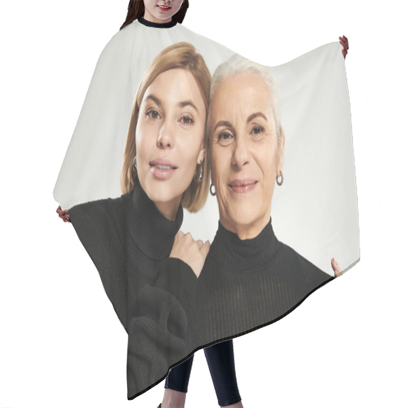 Personality  A Mature Woman And Her Adult Daughter Share A Warm Embrace. Hair Cutting Cape