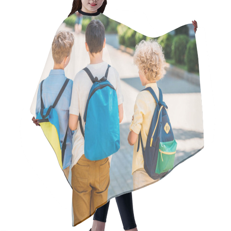 Personality  Rear View Of Pupils With Backpacks Walking Together Hair Cutting Cape