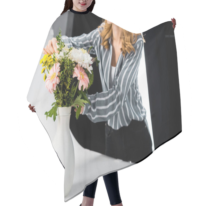 Personality  Cropped Shot Of Smiling Young Woman Arranging Flowers In Photo Studio Hair Cutting Cape