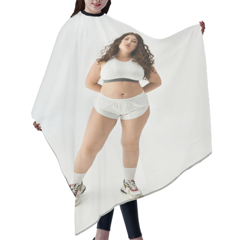 Personality  A Stylish Young Plus Size Woman Shines In Trendy Underwear Against A Clean, Minimal Backdrop. Hair Cutting Cape