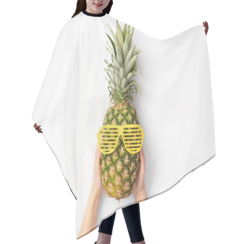 Personality  Cropped View Of Woman Holding Pineapple In Sunglasses On White Background Hair Cutting Cape