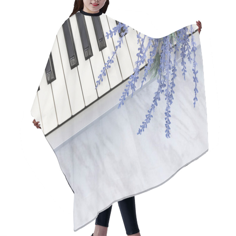 Personality  Sounds Of Nature. Blue Lavender Flowers On Piano Keys, On Marble Background. Hair Cutting Cape