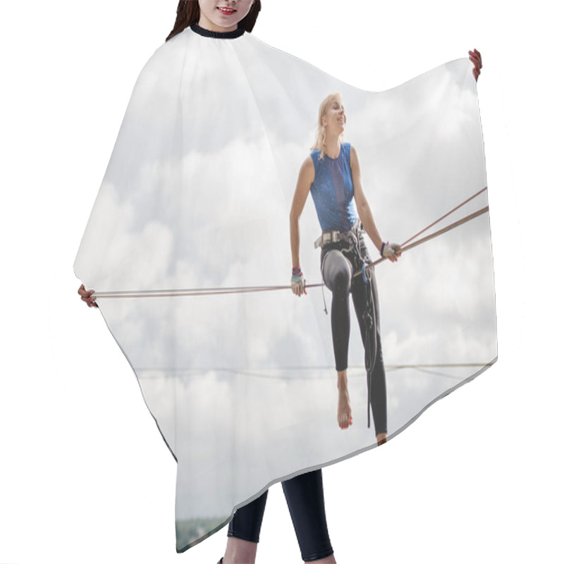 Personality  Young Smiling Blondie Woman Sitting On The Slackline Rope On The Background Of Clear Sky Hair Cutting Cape