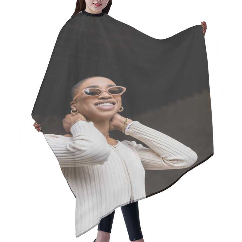 Personality  Low Angle View Of Trendy African American Woman In Sunglasses Smiling On Urban Street  Hair Cutting Cape