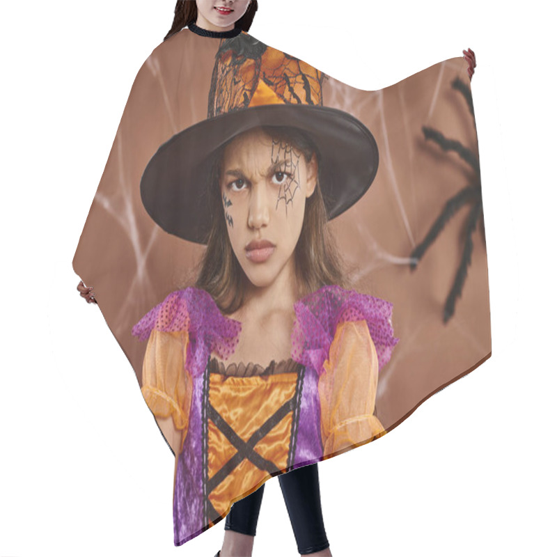 Personality  Displeased Girl In Witch Hat And Halloween Costume Frowning On Brown Background, Spooky Season Hair Cutting Cape