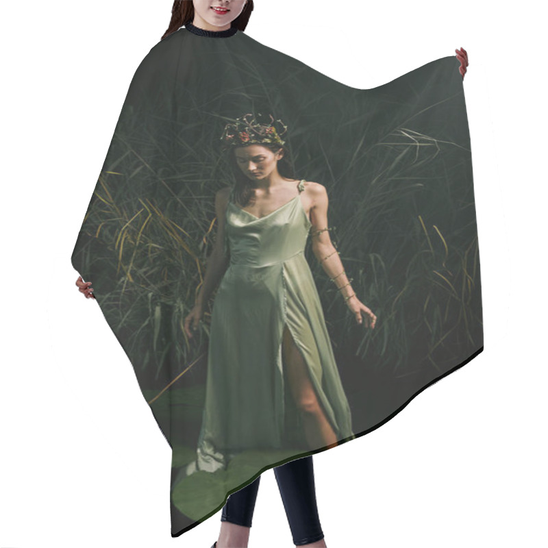 Personality  A Woman Stands Gracefully On Lily Pads In A Swamp, Wearing A Flowing Green Dress And A Floral Crown. Hair Cutting Cape