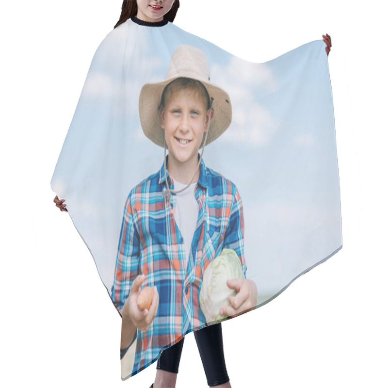 Personality  Happy Boy In Panama Hat Holding Ripe Vegetables And Smiling At Camera Outdoors Hair Cutting Cape