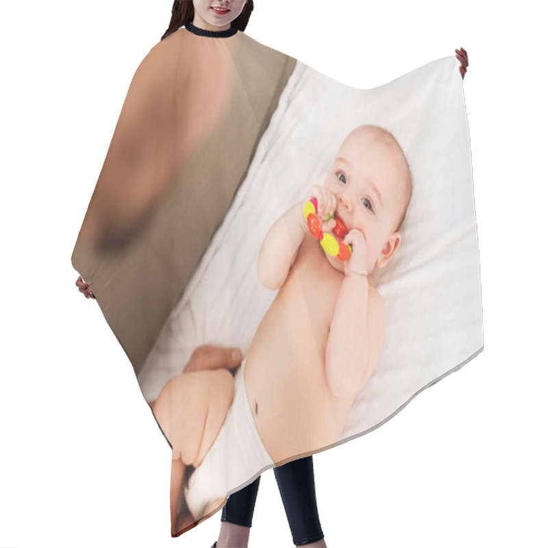 Personality  Close Up Of Father And Baby With Rattle Hair Cutting Cape