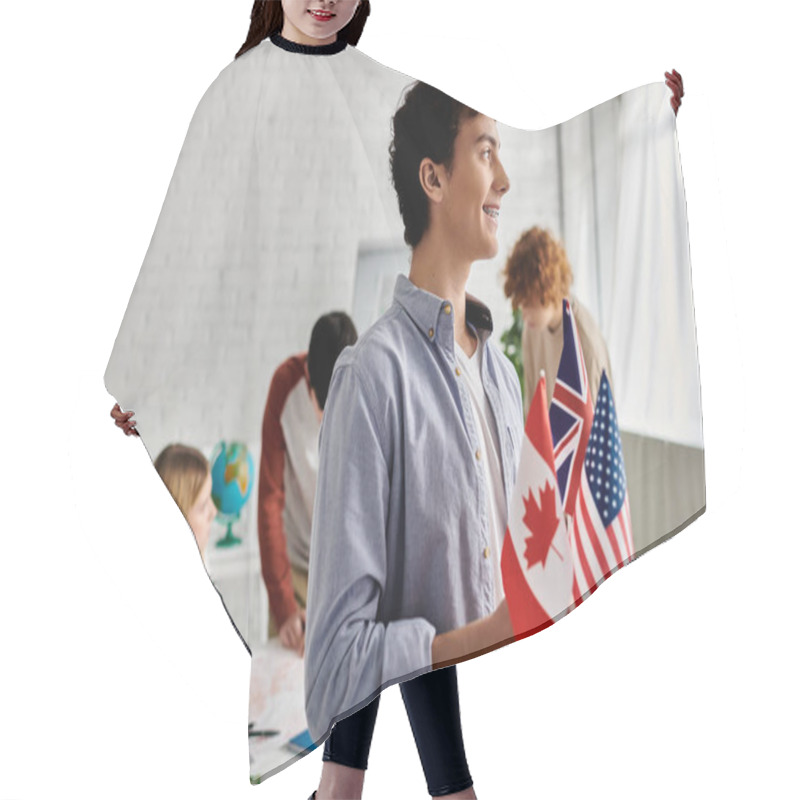 Personality  Teen Boy Holds Flags Of Canada, UK, US In Model UN. Hair Cutting Cape