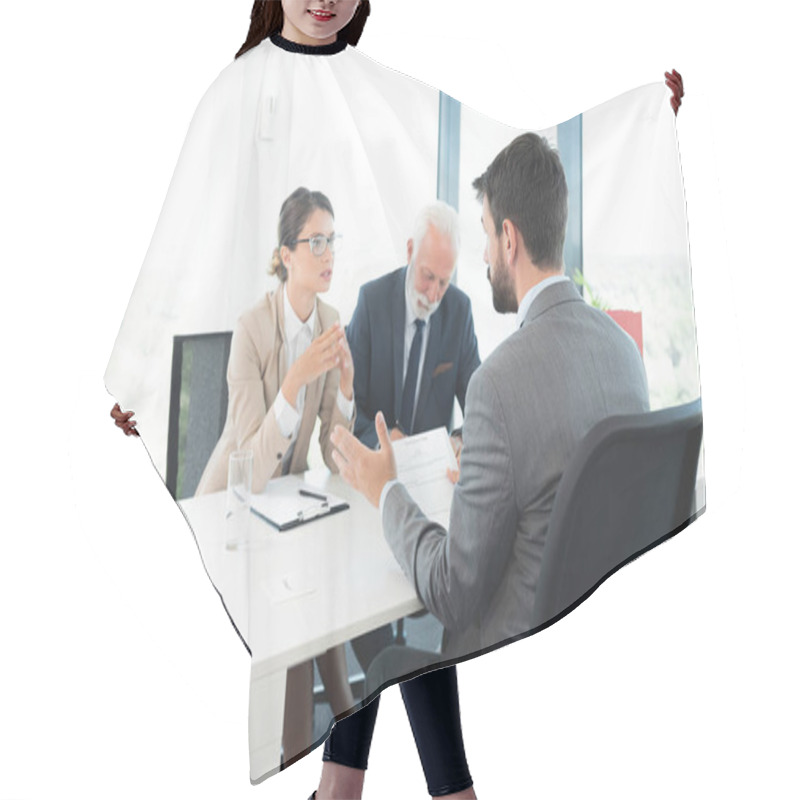 Personality  Business People Interviewing Male Applicant At Office Hair Cutting Cape