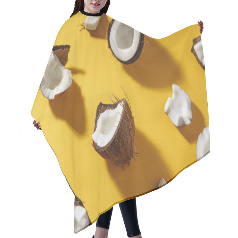 Personality  Coconut Halves And Pieces On Yellow Background, Top View   Hair Cutting Cape