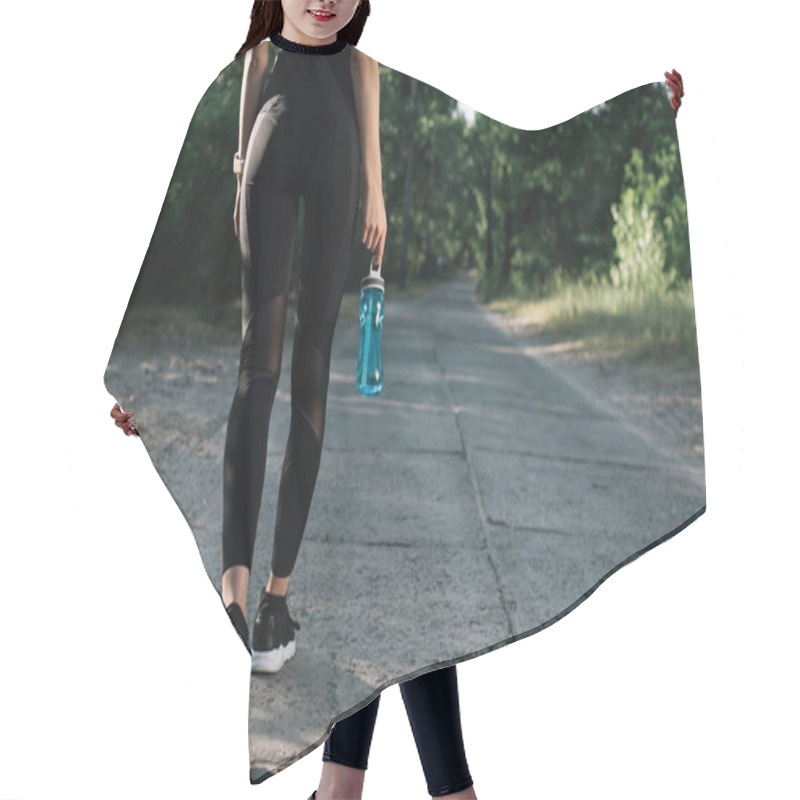 Personality  Cropped View Of Sportswoman With Sports Bottle Of Water Walking On Path Hair Cutting Cape