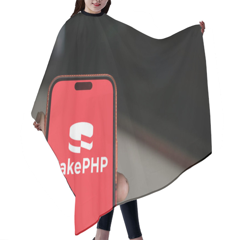 Personality  Dhaka, Bangladesh- 11 Nov 2024: CakePHP Logo Is Displayed On Smartphone. CakePHP Is An Open-source Web Framework. Hair Cutting Cape