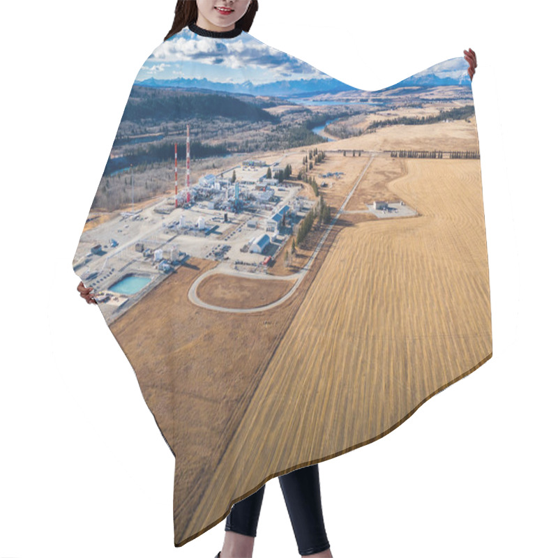 Personality  Cochrane Alberta Canada, October 30 2024: Natural Gas Plant Aerial View Overlooking Pastures And Rolling Hills With Canadian Rockies At Background. Hair Cutting Cape