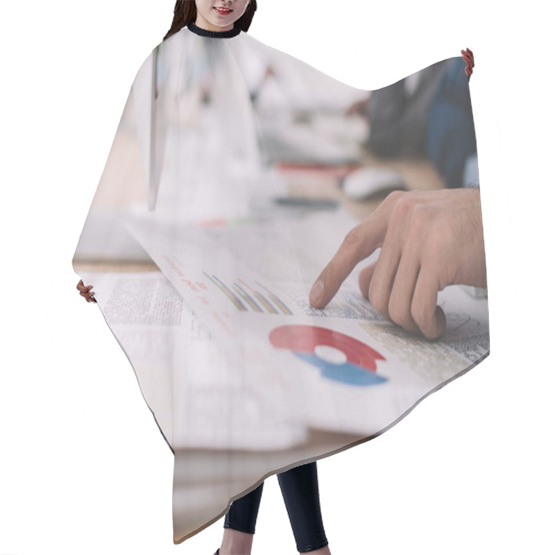 Personality  Cropped View Of Data Analyst Pointing With Finger At Charts Near Computer On Table  Hair Cutting Cape