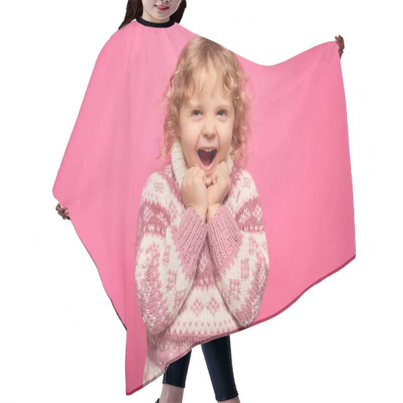 Personality  A Young Child Beams With Excitement, Posing With Clenched Fists And A Wide Grin. The Bright Pink Backdrop Enhances The Joyous Atmosphere, Highlighting Her Cheerful Demeanor. Hair Cutting Cape