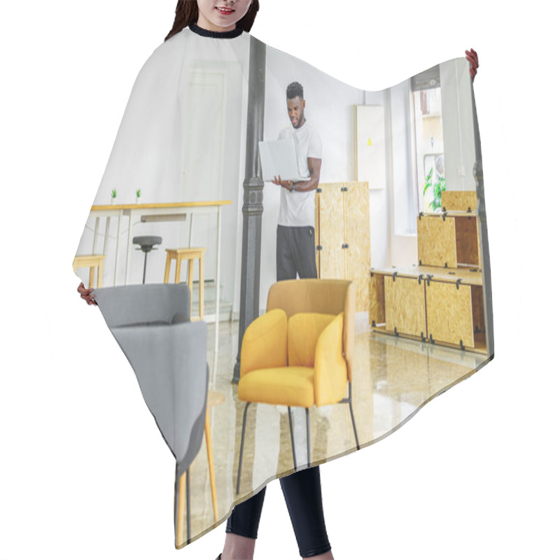 Personality  A Young Man Stands Focused On His Laptop In A Bright, Minimalist Co-working Space, Surrounded By Stylish Furniture And Decor That Fosters Creativity And Productivity. Hair Cutting Cape