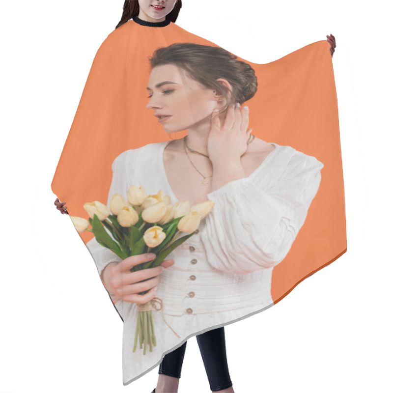 Personality  Fashion Concept, Young Woman In White Sun Dress Holding Yellow Tulips And Standing On Orange Background, Lady In White, Vibrant Background, Fashion, Summer, Bouquet Of Flowers  Hair Cutting Cape