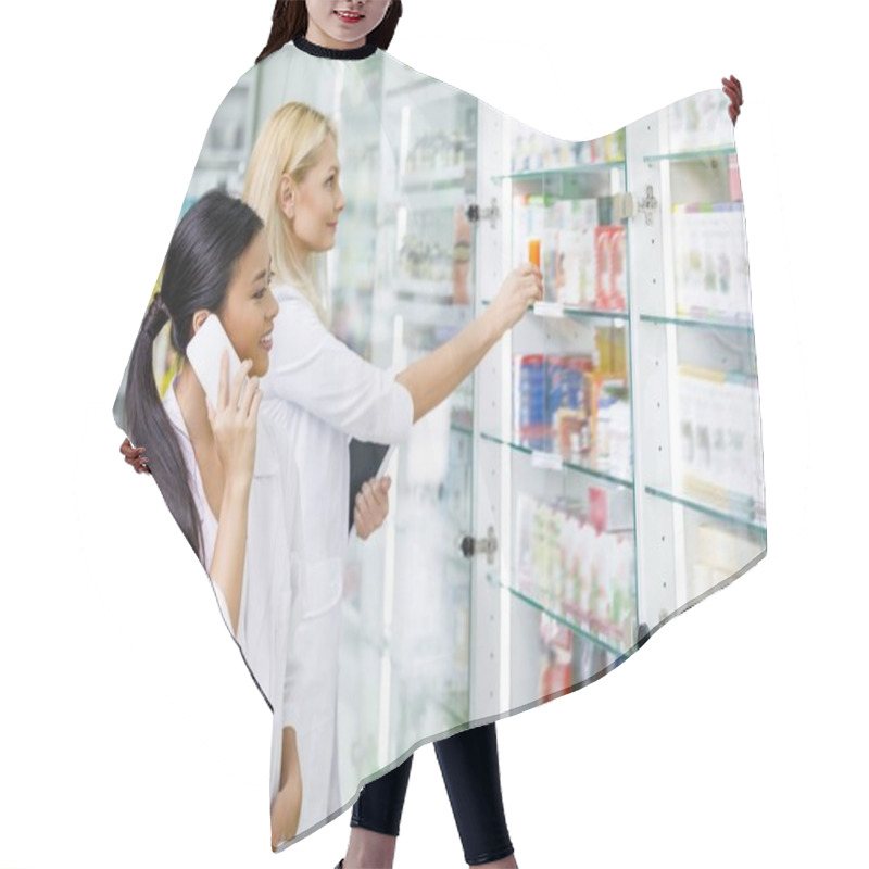 Personality  Pharmacists With Devices In Drugstore  Hair Cutting Cape