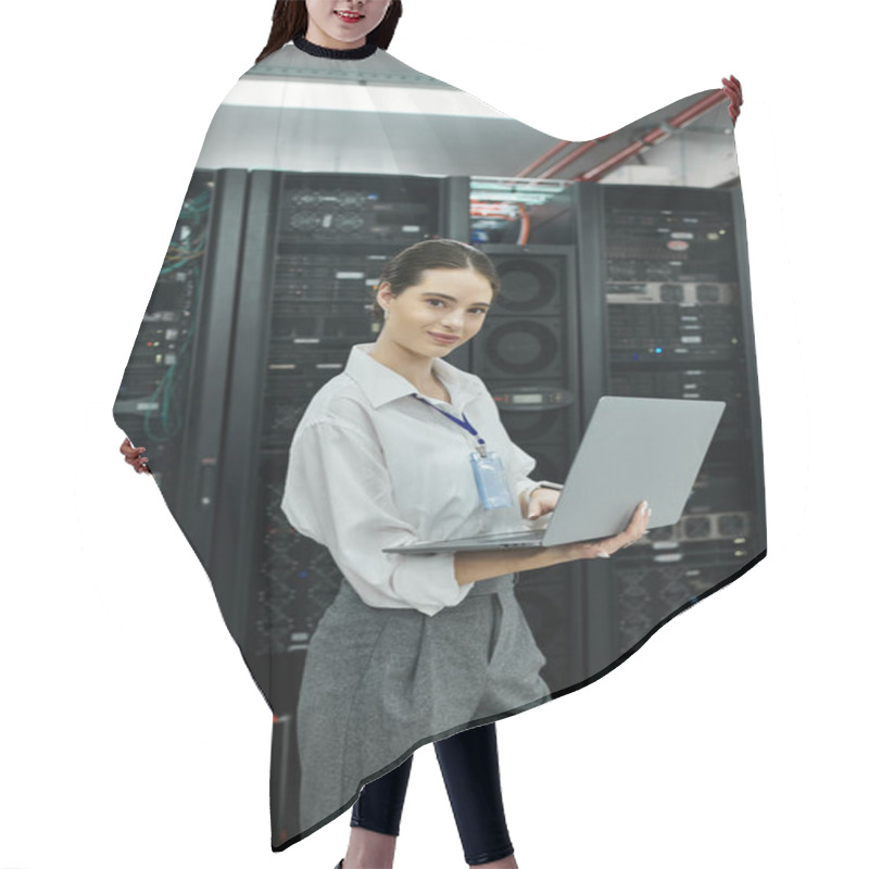 Personality  Woman In A White Shirt Is Efficiently Working On A Laptop In A Sophisticated Server Room. Hair Cutting Cape