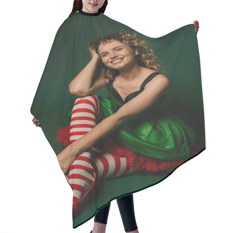 Personality  Cheerful Woman In New Year Elf Costume And Striped Stockings Smiling At Camera On Green Backdrop Hair Cutting Cape