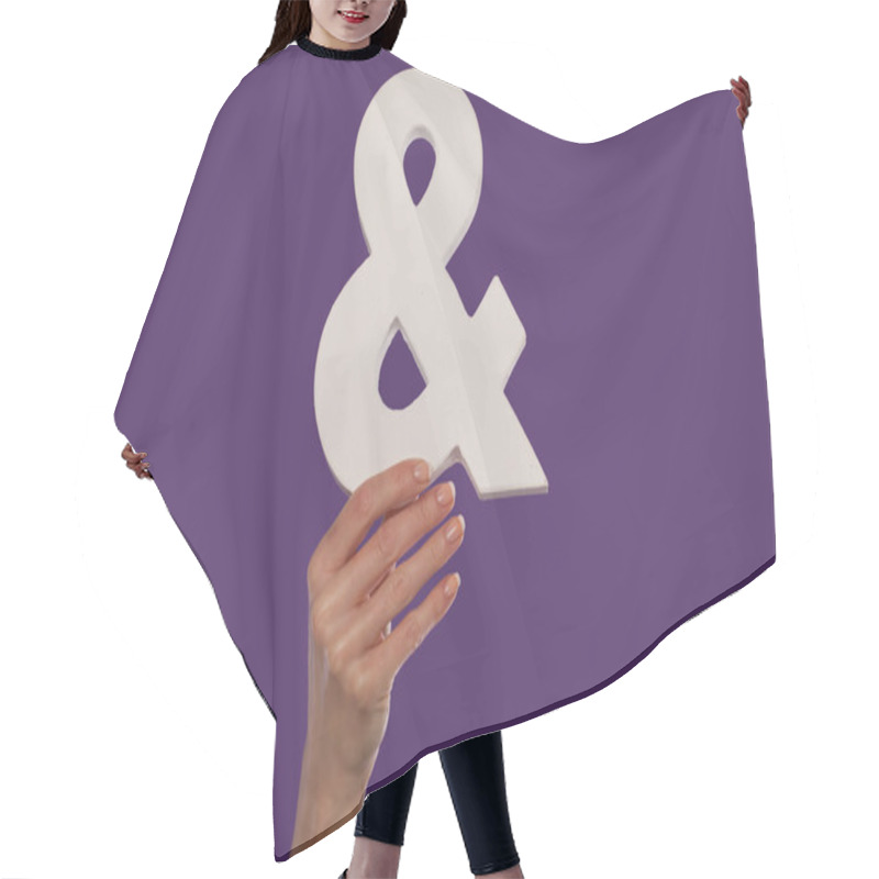 Personality  Female Hand Holding Up An Ampersand From The Bottom Hair Cutting Cape