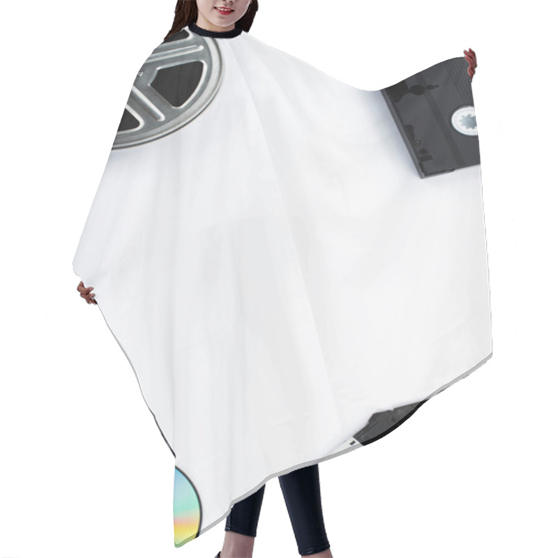 Personality  Top View Of CD Discs, VHS Cassette, Diskettes And Film Reel On White Background Hair Cutting Cape