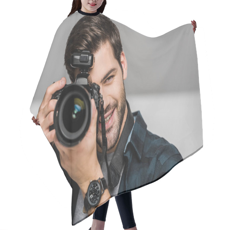 Personality  Handsome Happy Young Man Photographing With Camera In Studio  Hair Cutting Cape