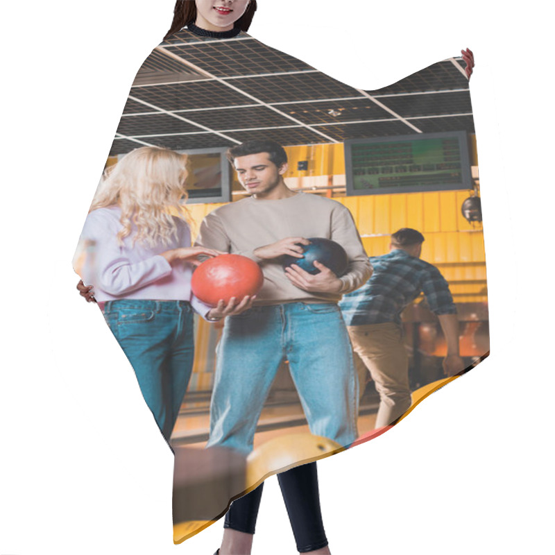 Personality  Handsome Man Talking To Blonde Girlfriend While Holding Bowling Balls Hair Cutting Cape