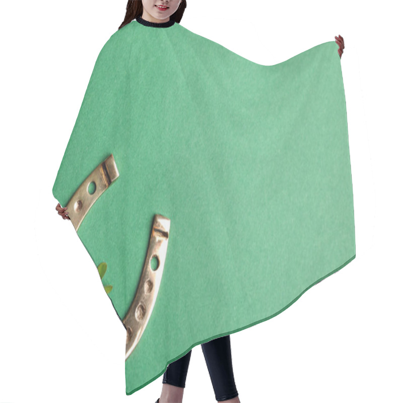 Personality  Flat Lay Composition With Horseshoe On Green Background, Space For Text. St. Patrick's Day Celebration Hair Cutting Cape