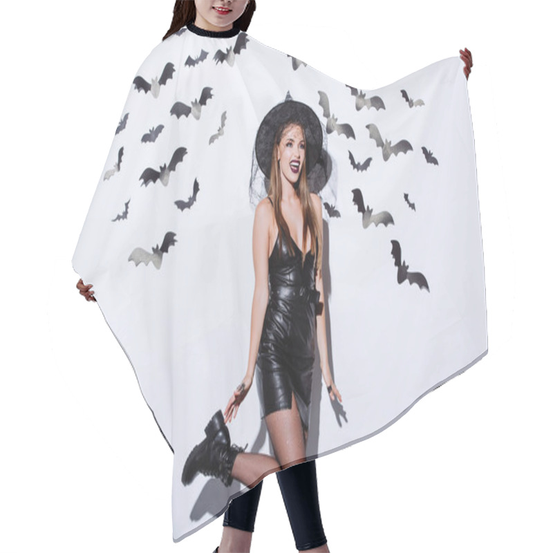 Personality  Girl In Black Witch Halloween Costume Near White Wall With Decorative Bats Hair Cutting Cape