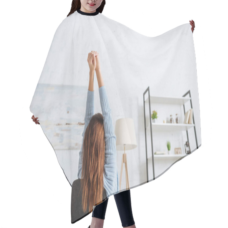 Personality  Back View Of Girl Chilling And Stretching Near Table At Home  Hair Cutting Cape